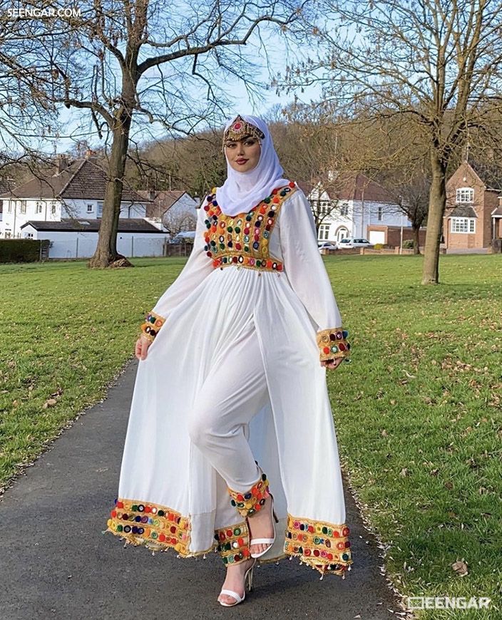 Ivory Afghan Kuchi dress with colorful beadwork