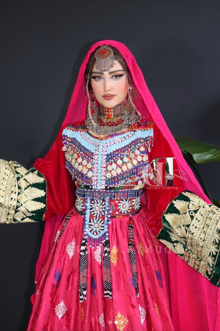 Ruby Afghan dress with dense beaded bodice