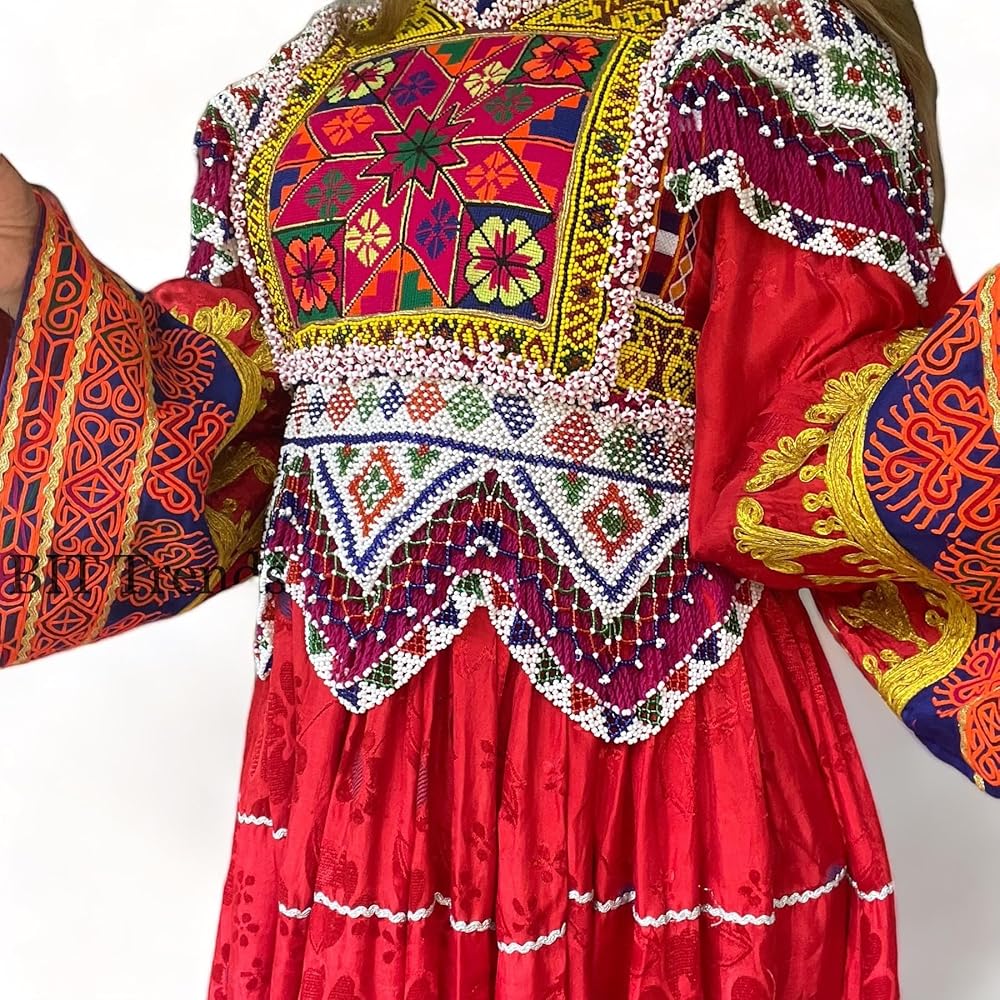Close view of red Afghan embroidery and beadwork