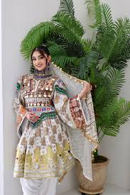 Afghan embroidered set with soft neutral fabric and detailed bodice